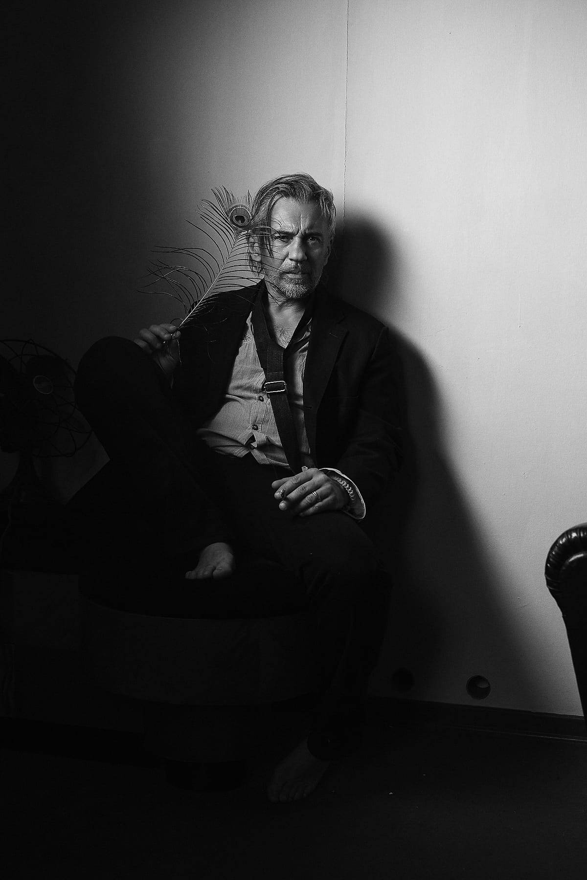 Black and white portrait of John De Leo